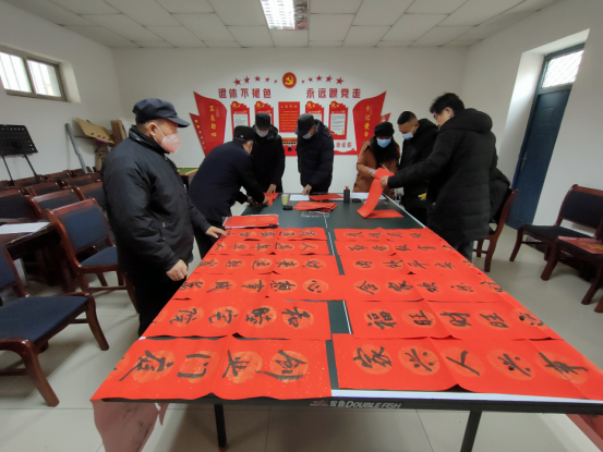【清廉单元】南街南关社区开展“迎春送福写春联，翰墨飘香倡廉洁”活动